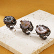 Handmade agate geode rings with rustic metal settings, natural crystal jewelry for spiritual healing and protection