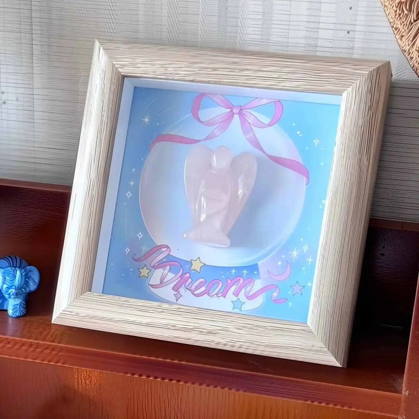 Framed rose quartz angel crystal with 'Dream' art, pink bow, stars — spiritual decor for healing and protection