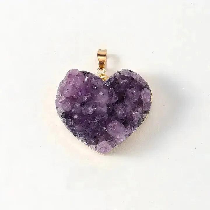 Heart-shaped amethyst crystal pendant for love and spiritual healing, handmade gemstone jewelry