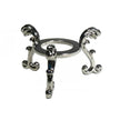 Elegant silver crystal stand with ornate scroll legs for displaying healing stones or jewelry