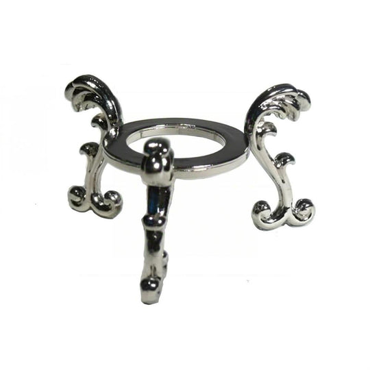 Elegant silver crystal stand with ornate scroll legs for displaying healing stones or jewelry