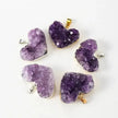 Heart-shaped amethyst crystal pendants for healing, love, and spiritual growth