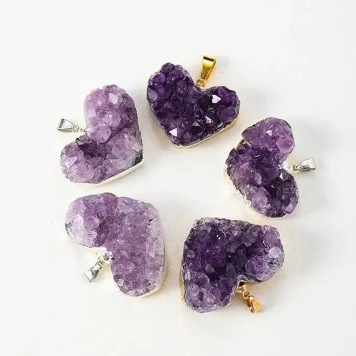 Heart-shaped amethyst crystal pendants for healing, love, and spiritual growth