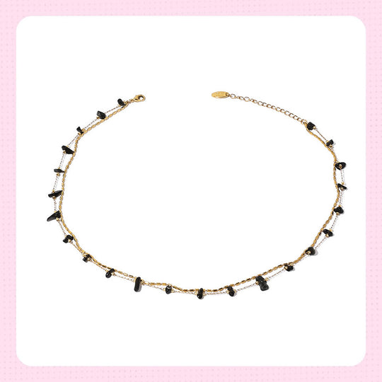Gold chain necklace with black crystal beads, ideal for protection and spiritual energy