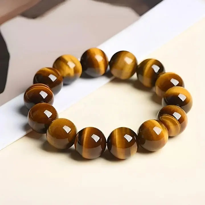 Tiger eye gemstone bracelet for protection and spiritual growth, handmade with polished beads