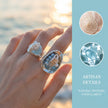 Handmade shell and aquamarine gemstone rings with artisan details, natural texture, and vivid clarity
