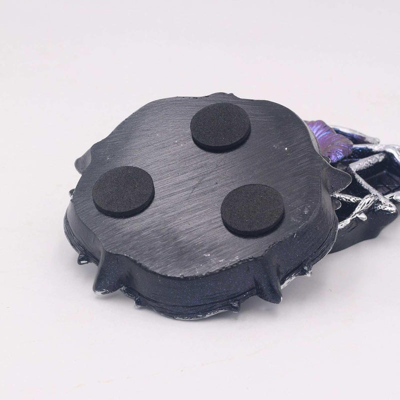 Black resin skull pendant with purple accents, ideal for spiritual jewelry and chakra healing