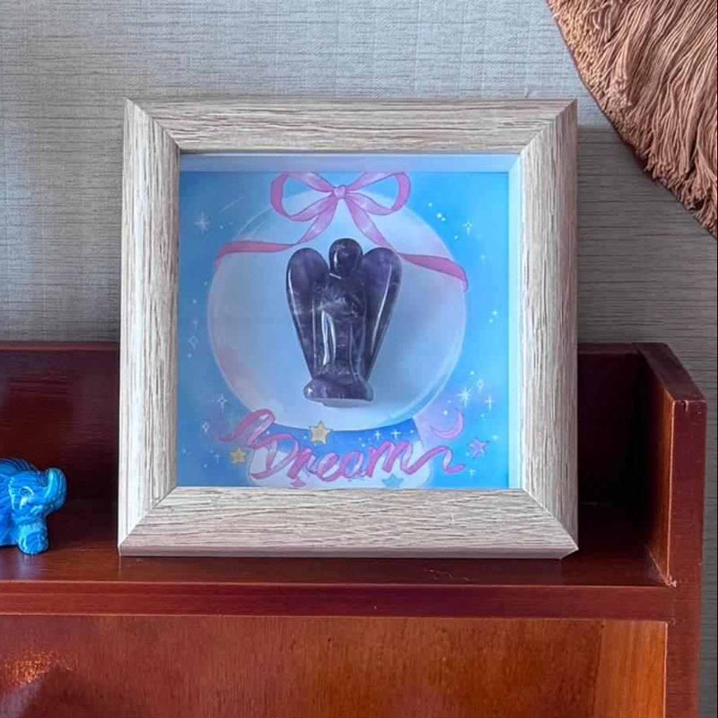 Framed angel crystal art with 'Dream' text, ideal for spiritual decor and chakra healing