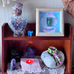 Crystal altar with amethyst, angel stone, and healing crystals for spiritual growth and protection