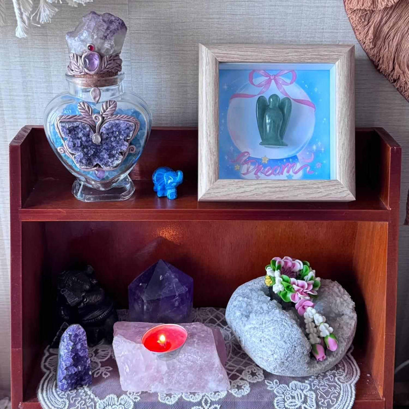 Crystal altar with amethyst, angel stone, and healing crystals for spiritual growth and protection
