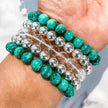 Malachite, clear quartz, and silver bead bracelets for healing, protection, and spiritual growth