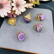 Amethyst crystal rings with gold settings, healing gemstone jewelry for spiritual growth and protection