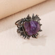 Amethyst crystal ring with spiky black setting, handmade gemstone jewelry for spiritual healing and protection