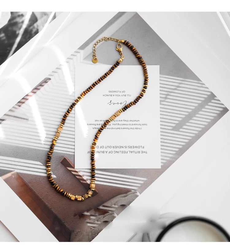 Tiger eye gemstone necklace with gold beads, healing crystal jewelry for spiritual growth and protection