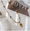 Gold beaded necklace with tiger eye pendant, healing crystal jewelry for spiritual growth and protection