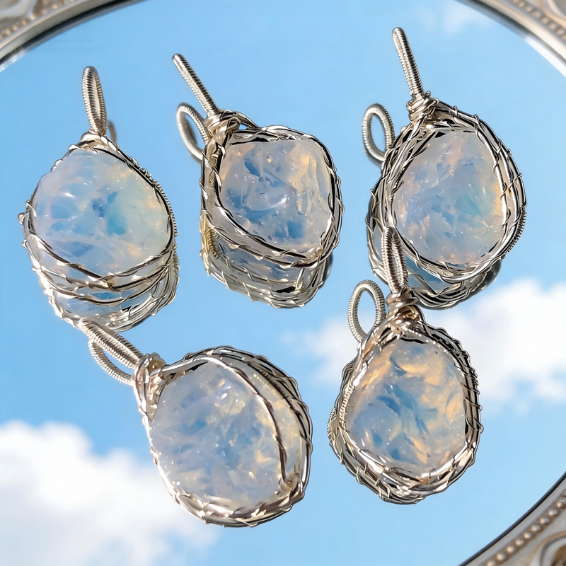 Handmade moonstone pendants with wire-wrapped settings, ideal for spiritual healing and chakra balance.