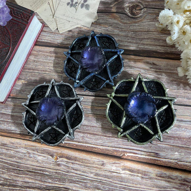 Three pentacle candle holders with amethyst centers, perfect for spiritual altars and crystal healing rituals.