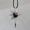 Handmade sunburst pendant with black crystal and silver wire wrap, spiritual jewelry for protection and healing
