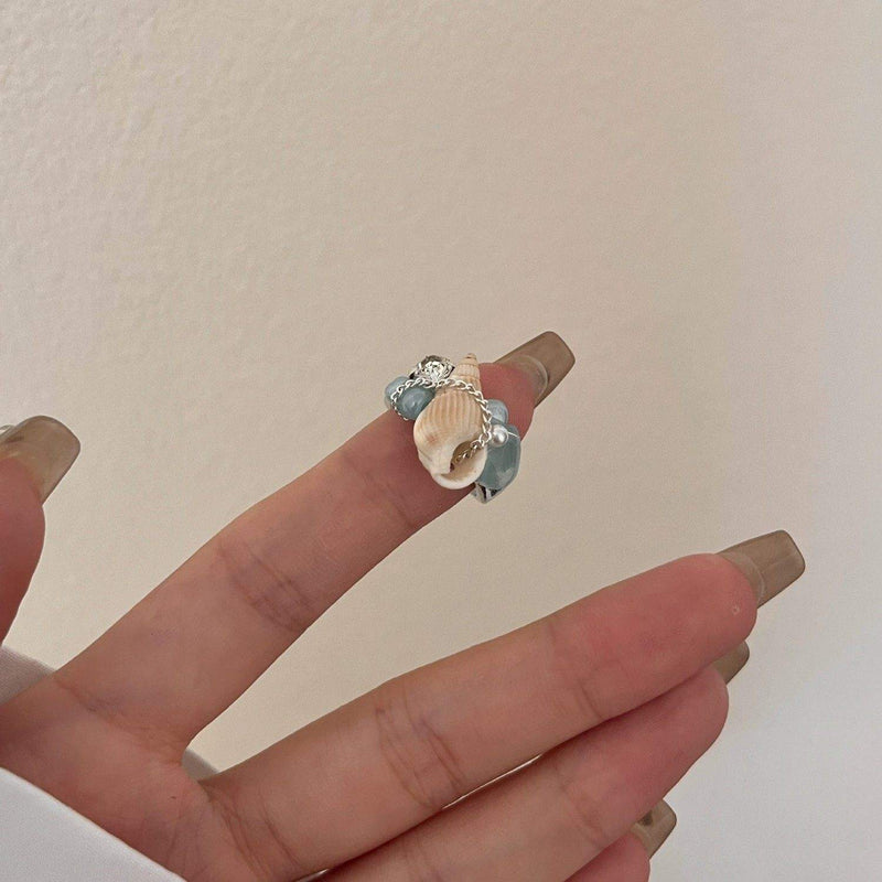 Handmade ring with seashell and blue gemstones, spiritual jewelry for healing and protection