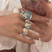 Handmade seashell and blue crystal rings with pearl accents, boho beach jewelry style