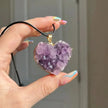 Heart-shaped amethyst crystal pendant on black cord, natural gemstone jewelry for love and healing