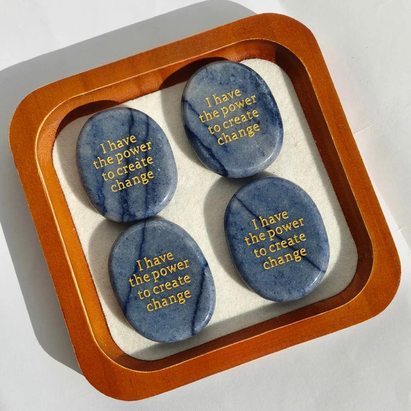 Blue sodalite affirmation stones with 'I have the power to create change' in gold, for spiritual growth and motivation