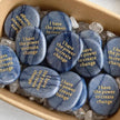 Blue sodalite affirmation stones engraved 'I have the power to create change' nestled in clear crystals