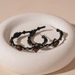 Black hoop earrings with tiger eye stones and crystal accents, spiritual jewelry for protection and healing